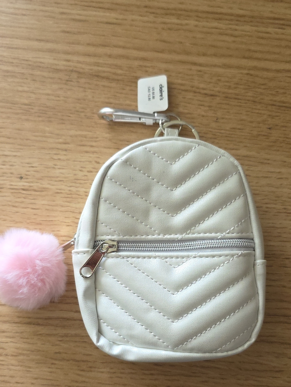 Claire's White Quilted Mini Backpack Keychain with Pink Pom Charm